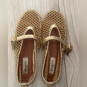 ALAIA BALLET FLATS IN LAMINATED FISHNET